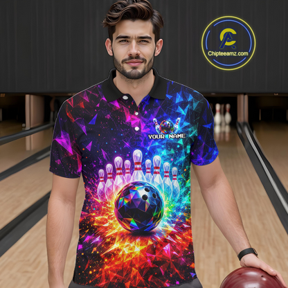 Man wearing a colorful bowling-themed shirt with a bowling ball design in a bowling alley.