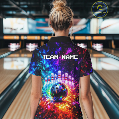 Person wearing a colorful bowling shirt with 'TEAM NAME' text in a bowling alley.