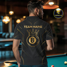 Load image into Gallery viewer, Man wearing a black and gold polo shirt with 'Team Name' and a crown design in a pool hall.