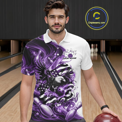 Male model front view in a bowling lane wearing a white and purple bowling polo shirt with eagle artwork and flowing flag inspired accents.