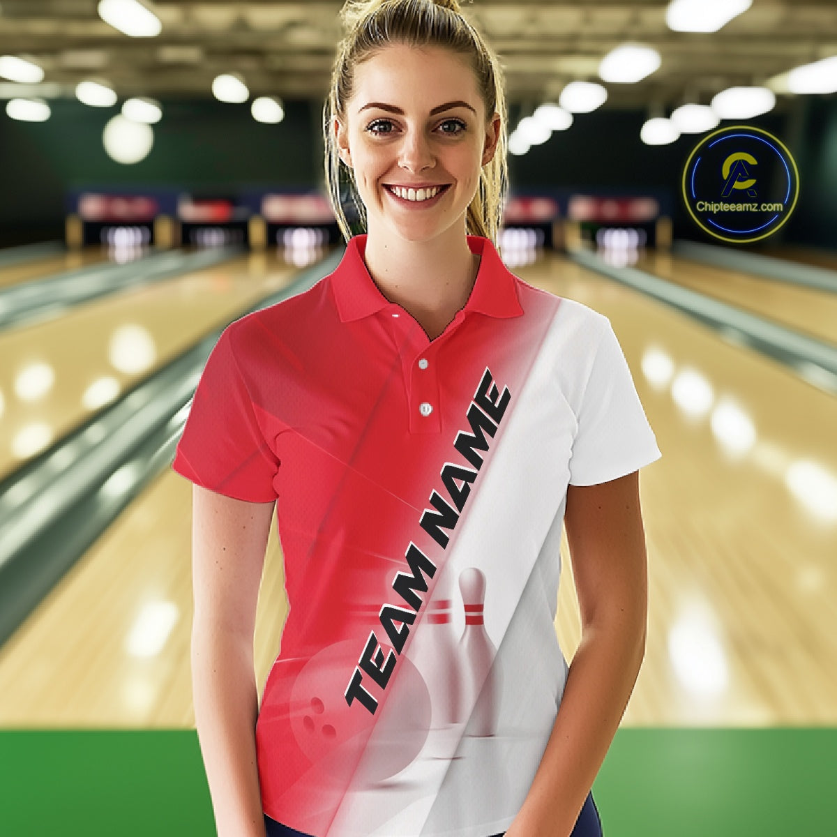 Front view of a female model at the bowling lane wearing a polo shirt with bowling ball and pins in a red and white diagonal layout.