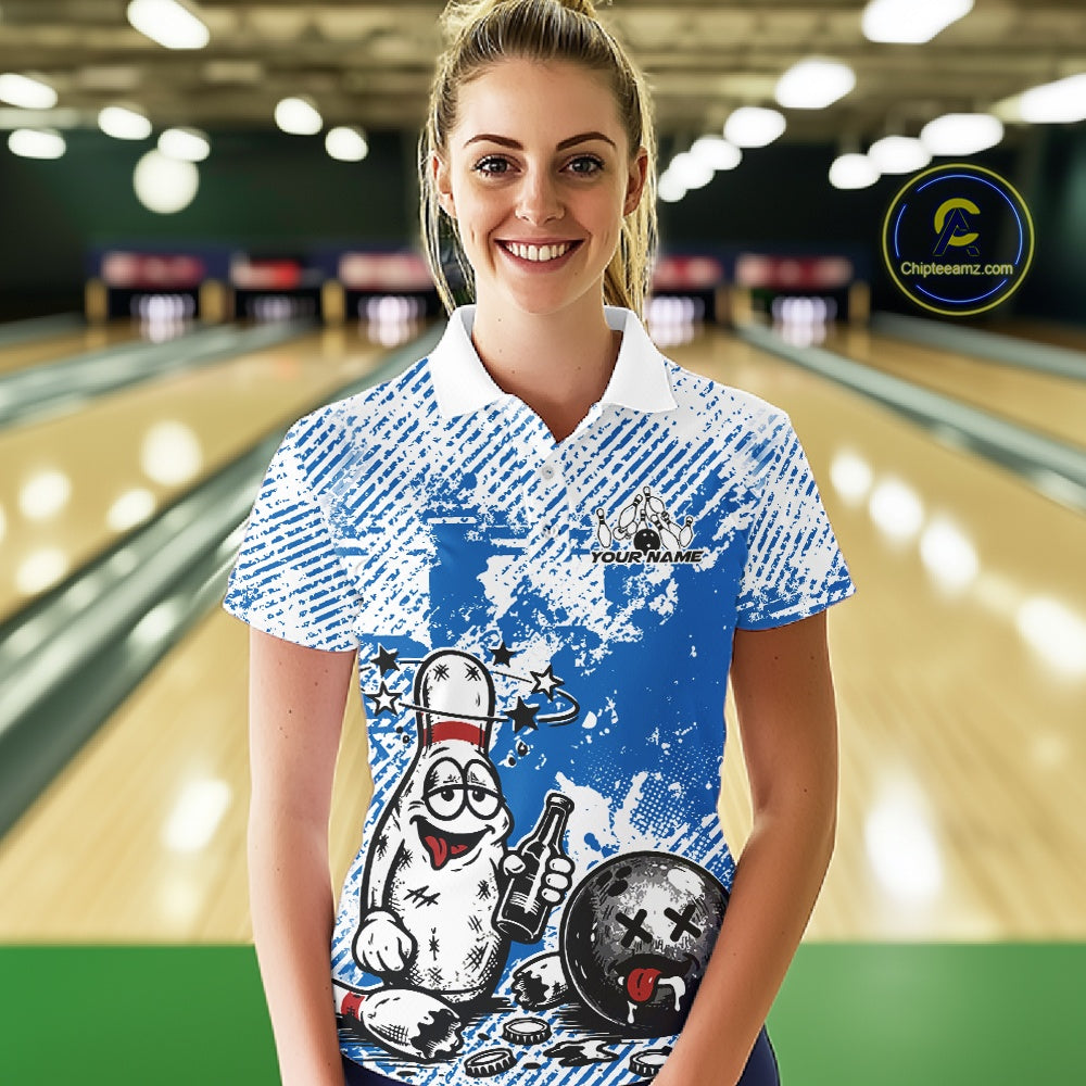 Female model at a bowling lane wearing a blue and white polo shirt, humorous drunk bowling pin artwork with beer bottle and bowling ball.