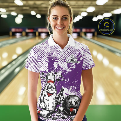Female model in a bowling lane wearing a purple and white polo shirt, humorous drunk bowling pin artwork holding beer bottle and bowling ball.