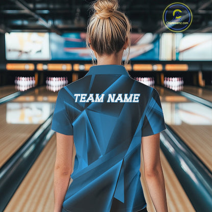 Person wearing a blue bowling shirt with 'TEAM NAME' on the back in a bowling alley.