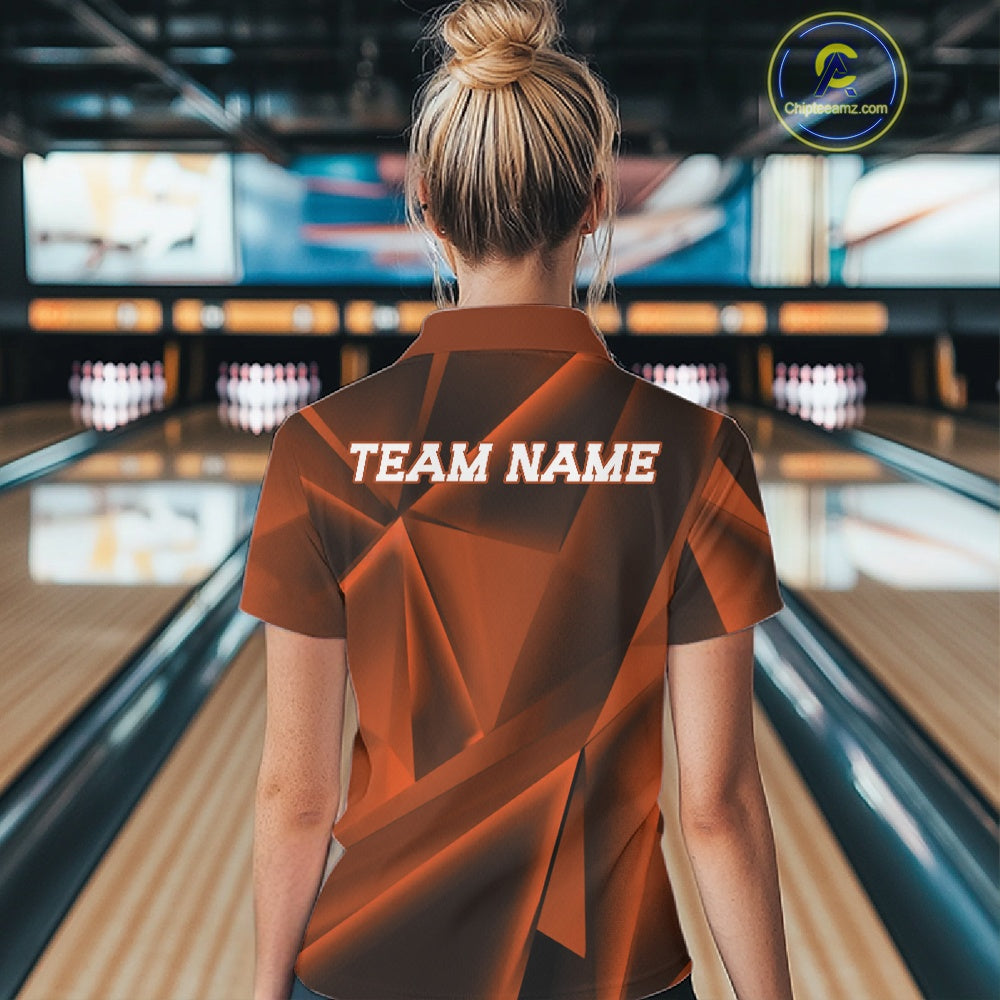 Person wearing a bowling shirt with 'TEAM NAME' on the back in a bowling alley.
