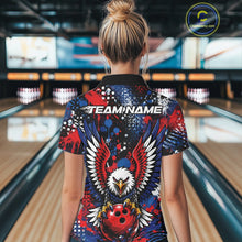 Load image into Gallery viewer, Female model showcasing the back design of a custom red, white, and blue patriotic eagle women's bowling polo shirt with a customizable "TEAM NAME" text template inside a bowling alley.