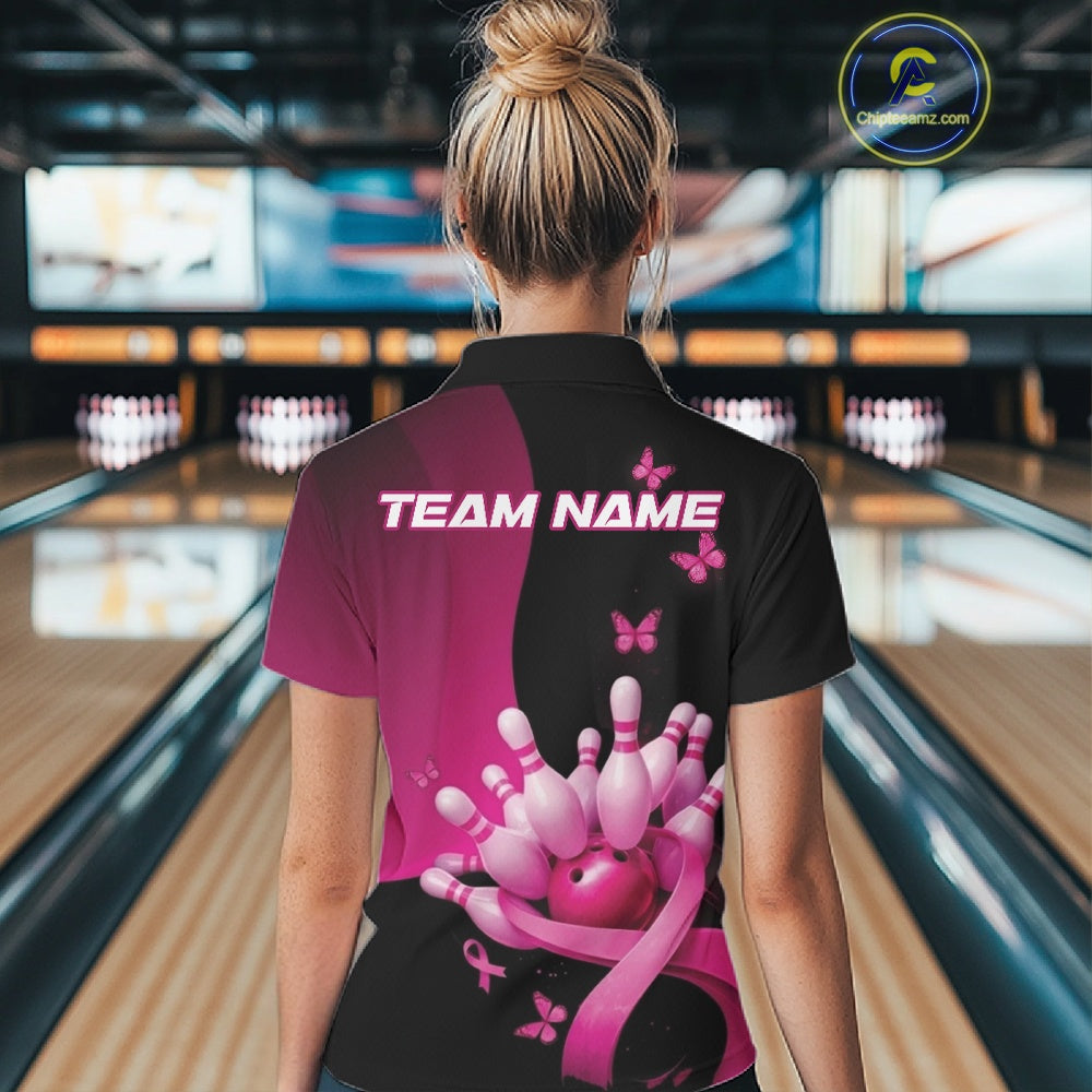 Female model at a bowling alley wearing a black and pink polo shirt, showcasing pink ribbon accents, butterflies, and bowling action graphics.