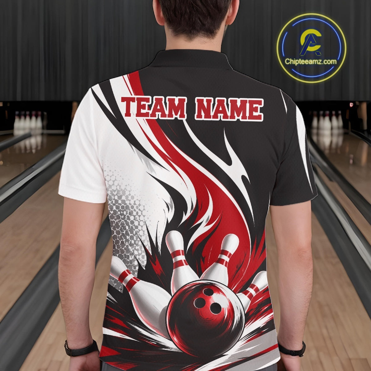 Back view of a male model wearing a white, black, and red bowling polo shirt showcasing a flaming bowling ball hitting the pins artwork in a bowling lane.