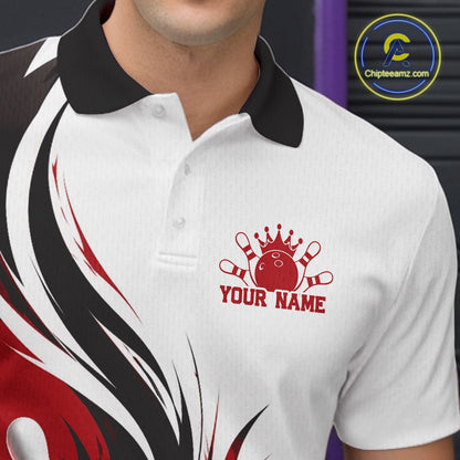 Close-up view of the left chest of a white, black, and red bowling polo shirt featuring a flaming bowling ball hitting the pins artwork.