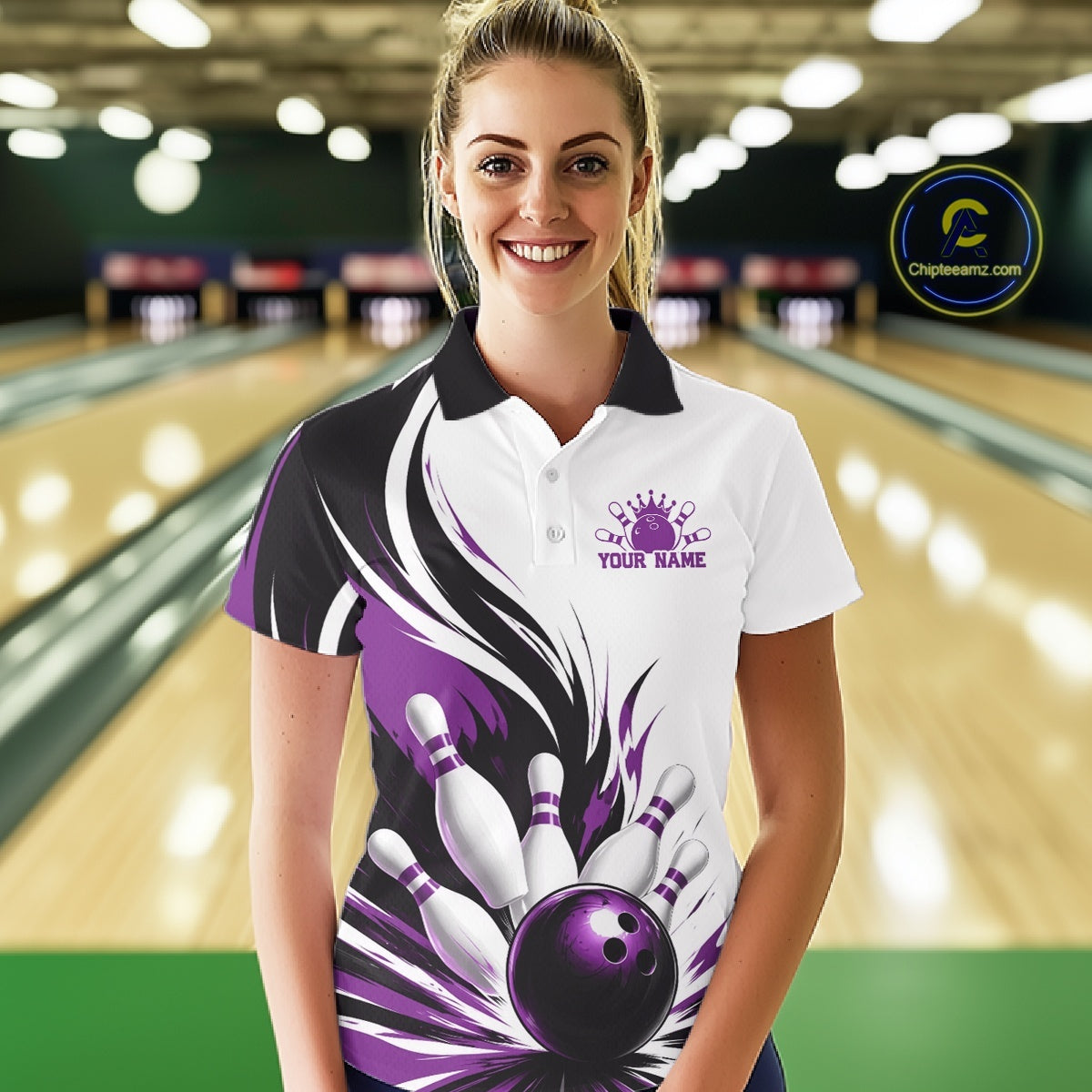 Front view of a female model wearing a white, black, and purple bowling polo shirt featuring a flaming bowling ball striking pins in a bowling lane.
