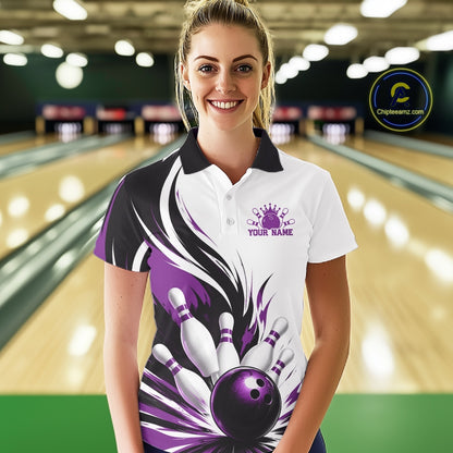 Front view of a female model wearing a white, black, and purple bowling polo shirt featuring a flaming bowling ball striking pins in a bowling lane.