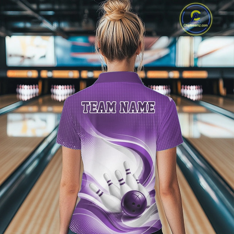 Back view of a female model in a white and purple bowling quarter-zip featuring elegant wave artwork and a dynamic bowling scene