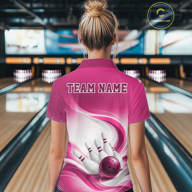 White and pink bowling quarter-zip worn by a female model, featuring fluid wave accents and a bowling ball knocking down pins