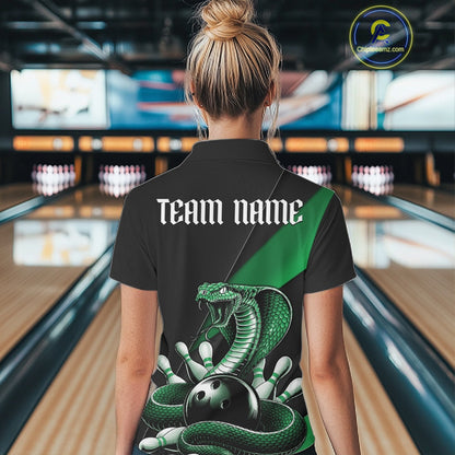 Back view of a black bowling quarter-zip displaying a green cobra wrapped around a bowling ball with scattered pins.