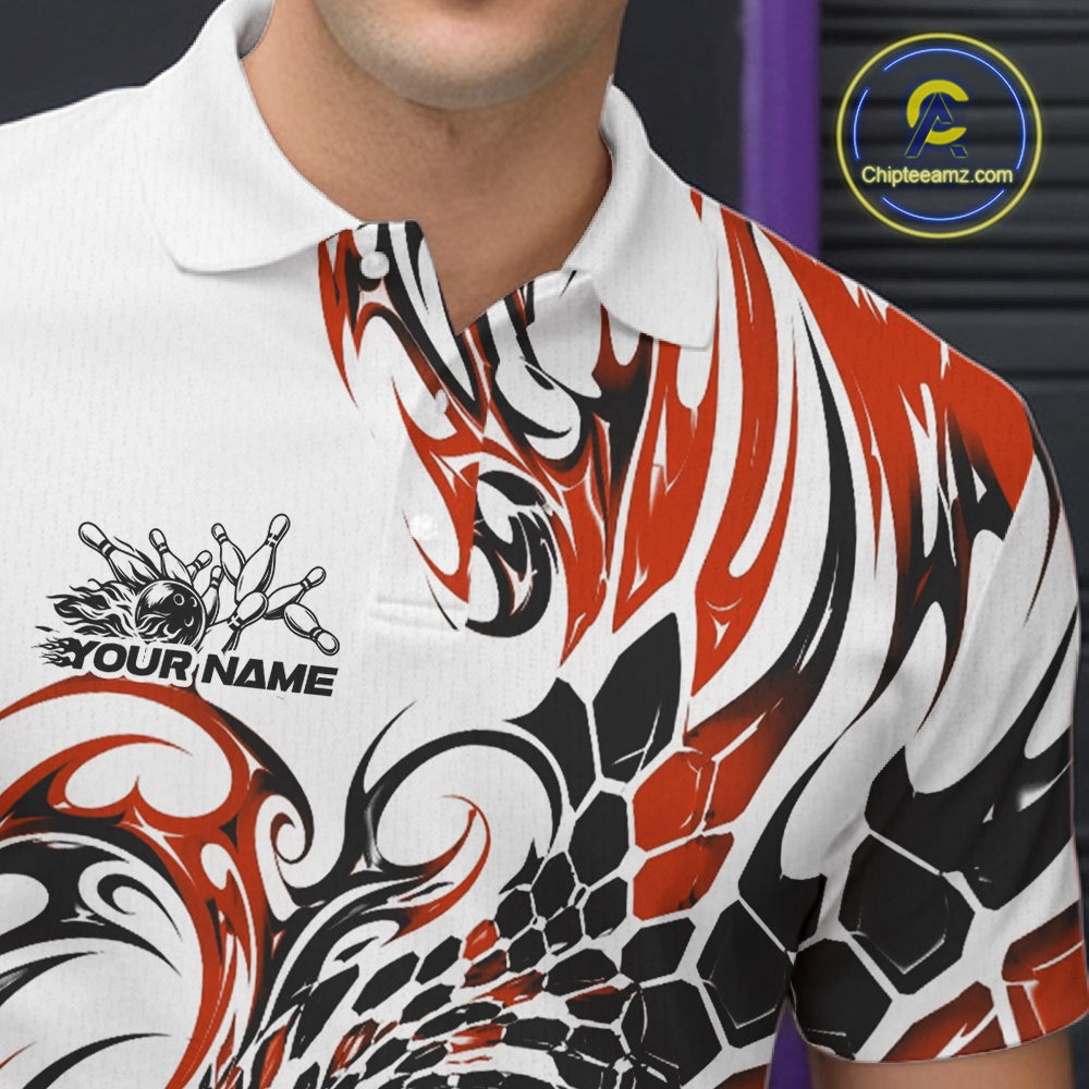 Detailed left chest view of a white bowling polo shirt featuring orange and black tribal motifs and honeycomb-inspired textures