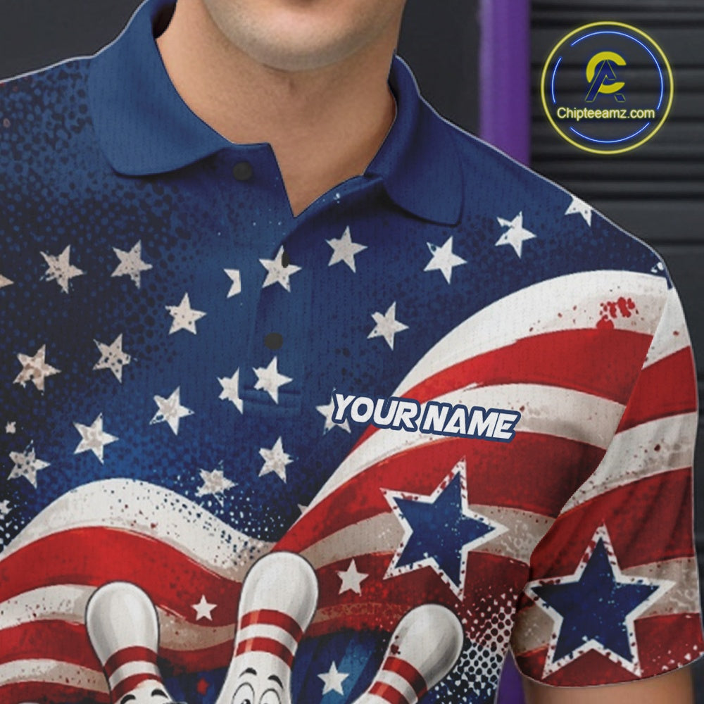 Close-up of the left chest on a bowling polo shirt featuring a funny bowling ball surrounded by cheerful animated pins with flowing American flag waves and scattered stars.