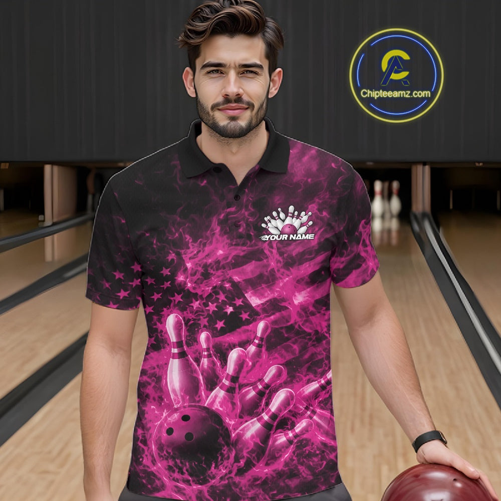 Male model at a bowling alley wearing a black and pink polo with fiery bowling graphics and patriotic details.