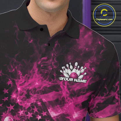 Left chest close-up of a black and pink bowling polo featuring a bowling ball, pins, flames, and flag-inspired accents.