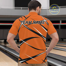 Load image into Gallery viewer, Front view of a male bowler wearing an orange, black, and white bowling quarter zip shirt in a bowling lane