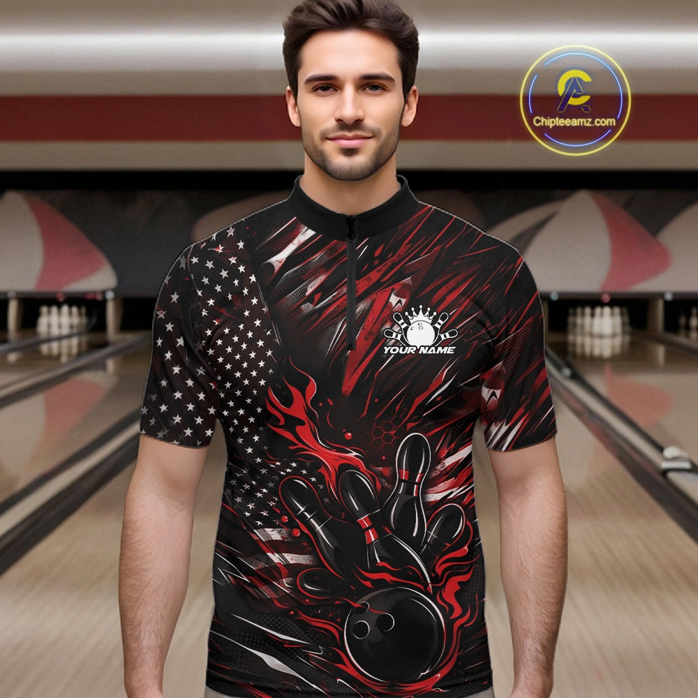 Male model wearing a black and red bowling quarter-zip shirt at a bowling lane with fiery bowling action artwork and patriotic accents.