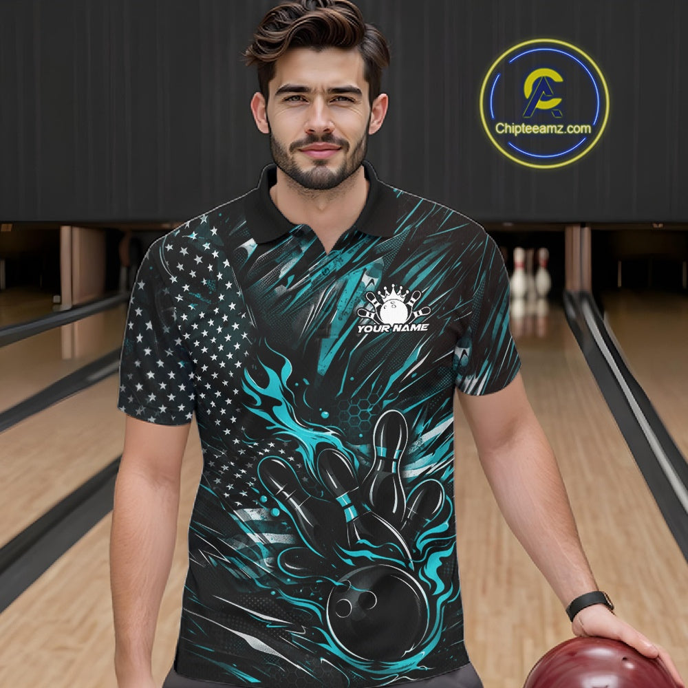 Male model at a bowling lane wearing a black and turquoise blue bowling polo shirt with fiery bowling action artwork and patriotic graphics.
