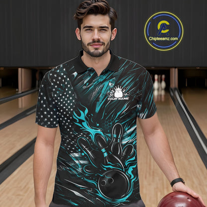 Male model at a bowling lane wearing a black and turquoise blue bowling polo shirt with fiery bowling action artwork and patriotic graphics.