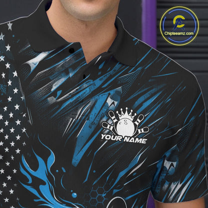 Close-up left chest detail of a black and blue bowling polo shirt featuring a patriotic bowling strike design with American flag elements.