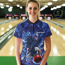 Load image into Gallery viewer, Front view of a female model in a bowling lane wearing a quarter zip shirt with eagle motif around a bowling ball, flag details, and pins.