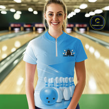 Load image into Gallery viewer, Front view female model at the bowling lane wearing a bowling quarter zip shirt with bowling ball and pins arranged across a pink gradient layout.