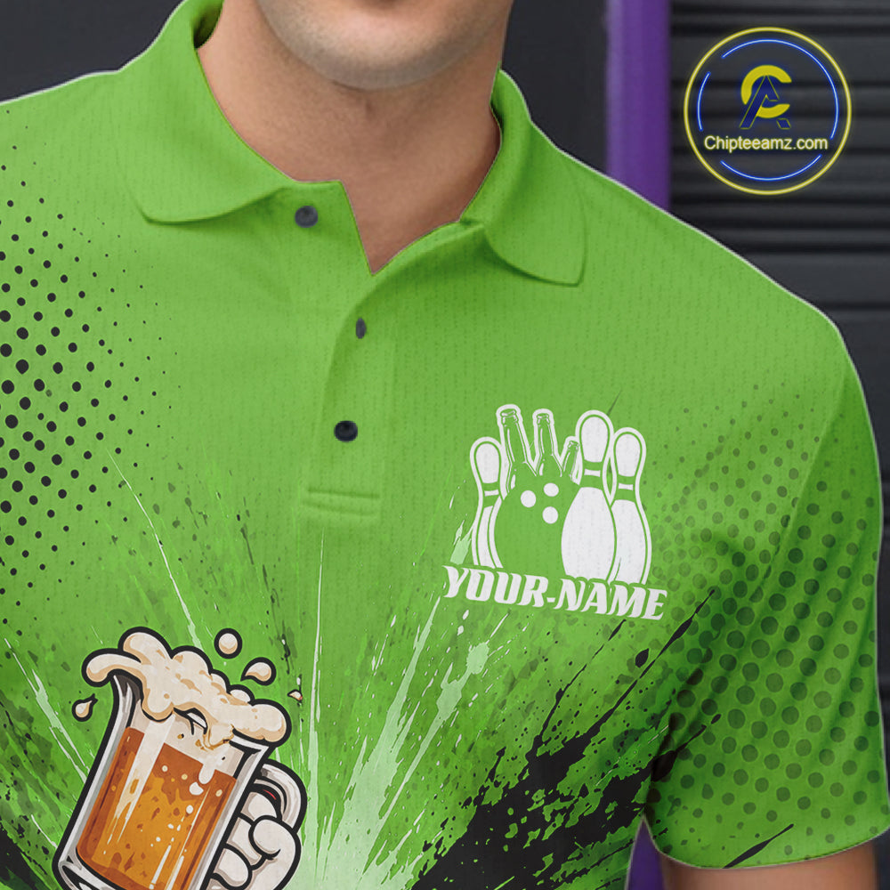 A close-up of a person wearing a bright green short-sleeve polo shirt with a bowling-themed graphic print. The shirt features a white bowling pins and 'YOUR NAME' text on the left chest, a large beer mug graphic on the lower left, and black halftone dot patterns fading into a green-to-black paint-splatter style on the right side.