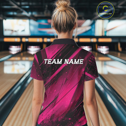 Person wearing a pink and black bowling shirt with 'TEAM NAME' text in a bowling alley.