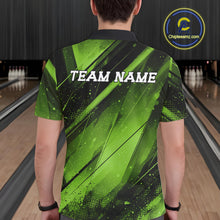 Load image into Gallery viewer, Person wearing a green and black bowling shirt with 'TEAM NAME' text on a bowling alley background.