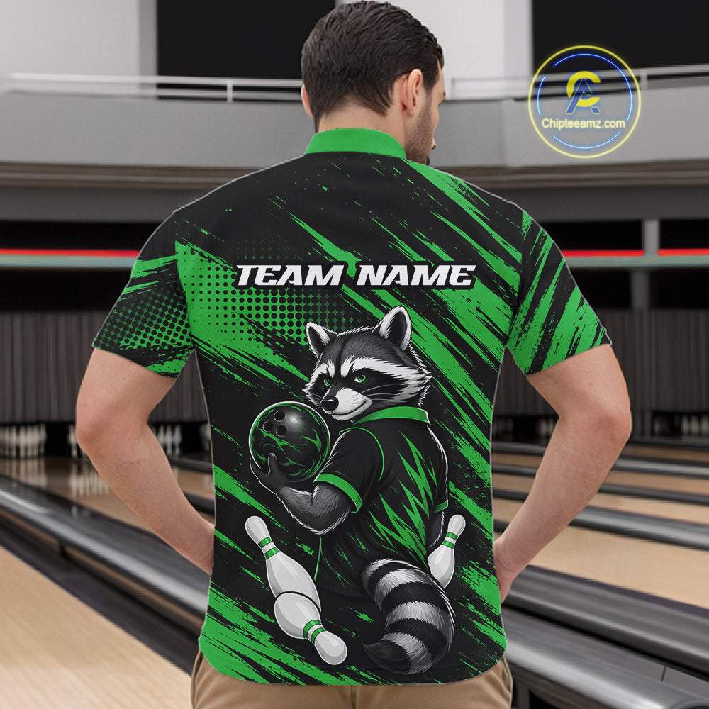A man viewed from behind wearing a custom bowling shirt with a raccoon graphic and 'TEAM NAME' text, set against a bowling alley background.
