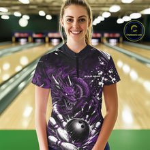 Load image into Gallery viewer, Woman wearing a purple bowling shirt with a dragon design in a bowling alley.