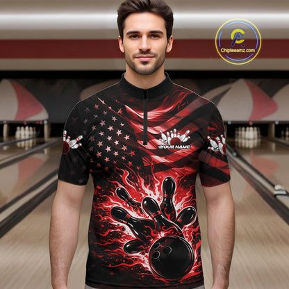Male model wearing a black bowling quarter-zip shirt at the bowling lane with red flame bowling graphics and patriotic accents.