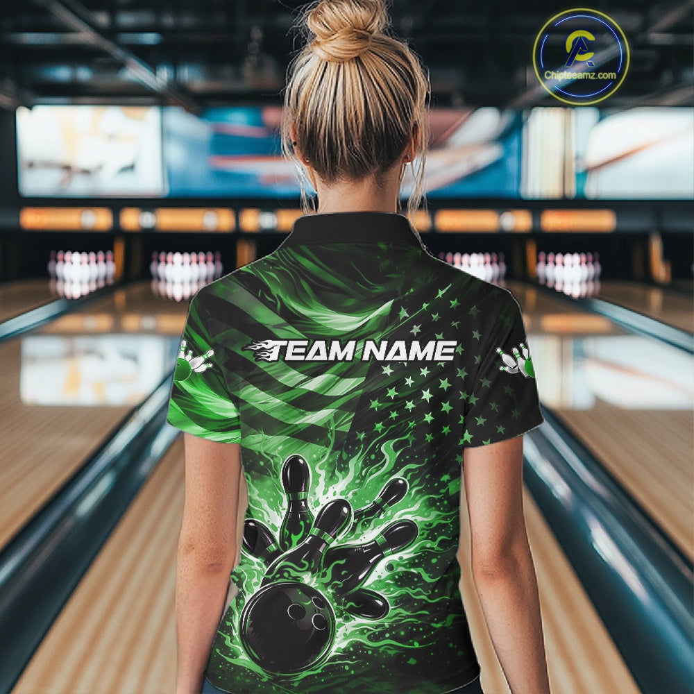 Back view of a female model in a black bowling polo shirt displaying green flame bowling strike graphics and flag-themed details.