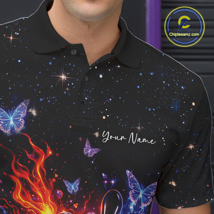 Left chest close-up of a black bowling polo shirt featuring a flaming bowling ball and glowing butterfly graphics.