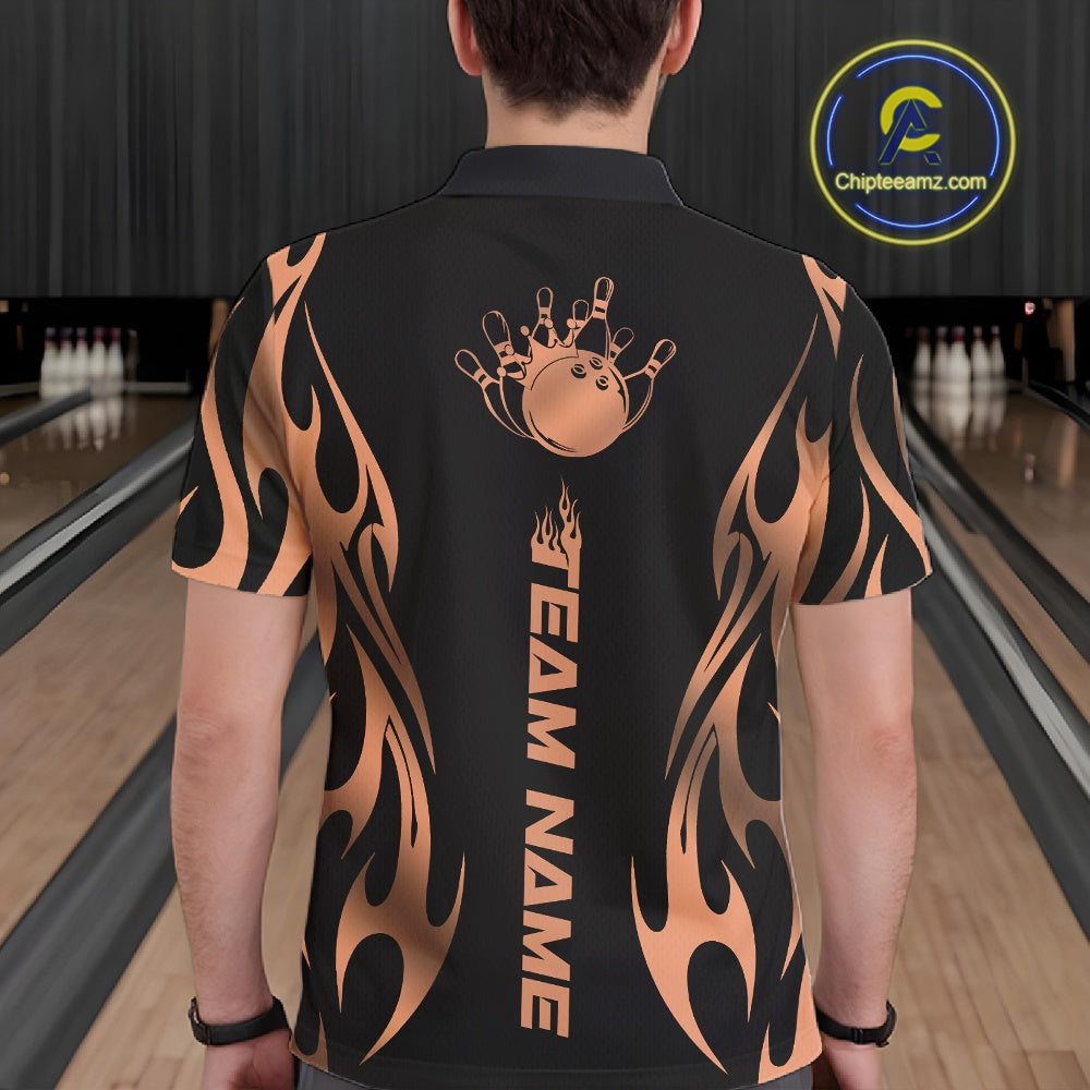 Male model seen from the back in a bowling lane wearing a black polo shirt featuring a rose gold gradient tribal flame bowling ball striking pins in a dynamic motion design.