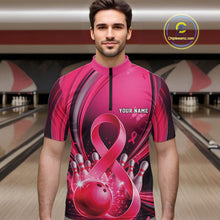 Load image into Gallery viewer, Male model wearing a pink and black bowling quarter zip with breast cancer awareness ribbon graphics and bowling artwork, front view at the bowling lane