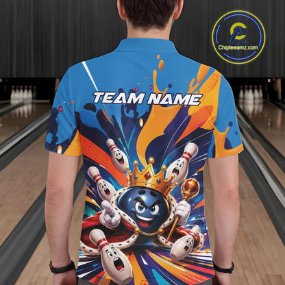 Back view of a male model wearing a bowling polo shirt featuring a crowned cartoon bowling ball holding a royal scepter with animated bowling pins, colorful paint splashes, and festive artwork in a bowling lane.