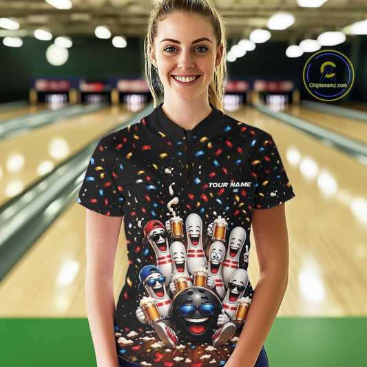 Front view of a female model wearing a bowling quarter zip shirt showcasing funny cartoon bowling balls and animated pins raising frothy beer mugs beneath falling confetti in a bowling lane.
