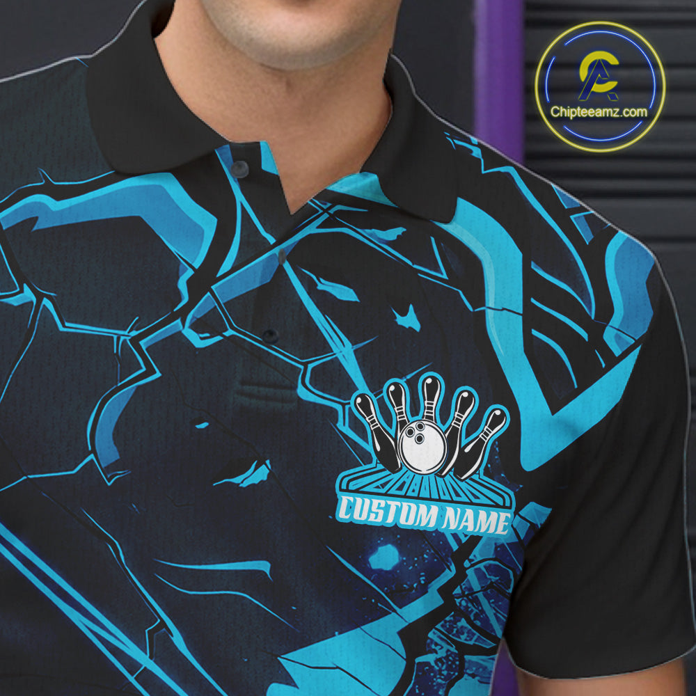 Left chest detail of a bowling polo featuring black and blue cracked geometric pattern artwork.