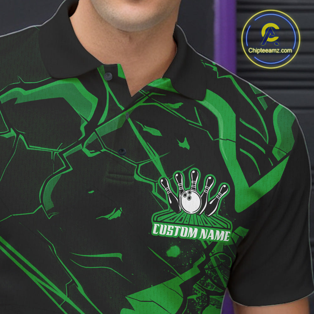Close-up left chest view of a bowling polo with black and green cracked geometric pattern details.