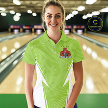 Load image into Gallery viewer, Front view of a female model in a bowling alley wearing a light green custom bowling polo shirt with a funny aggressive crawfish holding a bowling ball in a sportswear-style design.