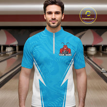 Load image into Gallery viewer, Front view of a male model in a bowling alley wearing a blue custom quarter-zip bowling shirt with a funny aggressive crawfish holding a bowling ball in a sportswear-style design.