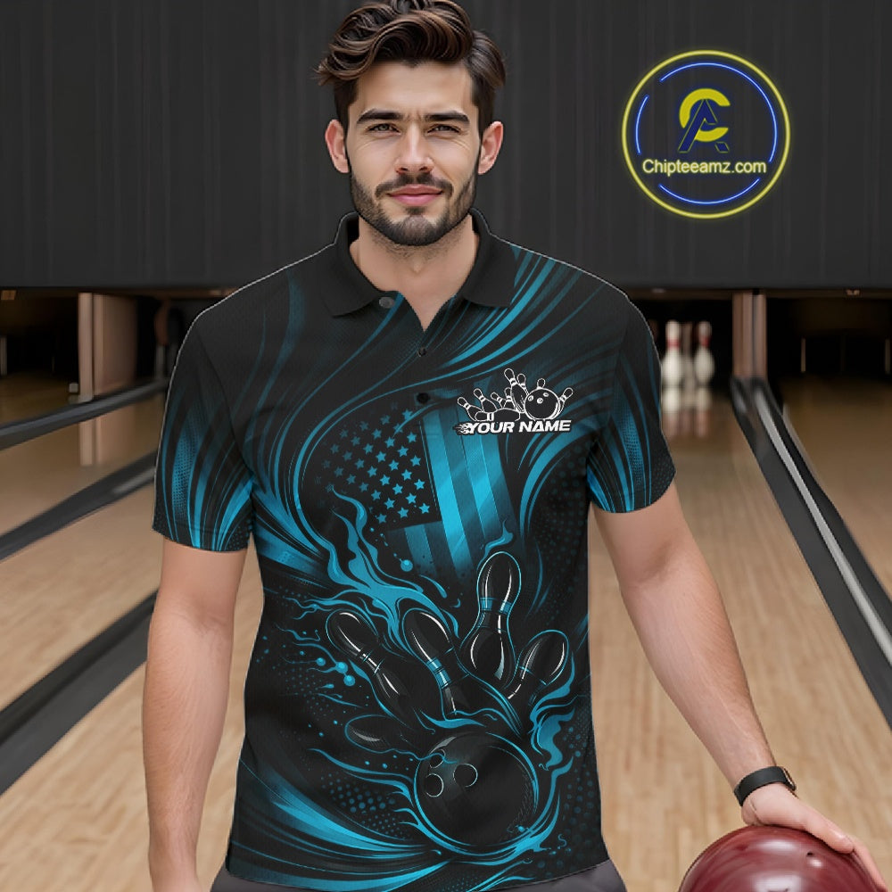 Male model at a bowling lane wearing a black and turquoise blue polo shirt with patriotic bowling strike graphics and flame accents.