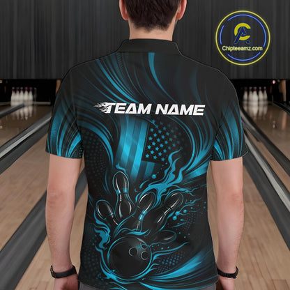 Back view of a male model in a bowling center wearing a black and turquoise blue polo featuring flaming bowling ball and pins artwork.