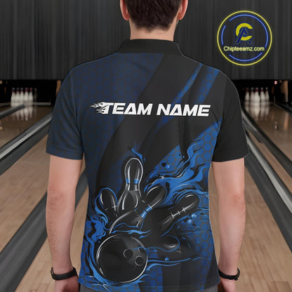 Back view of a male model in a bowling alley wearing a black and blue polo shirt featuring a bowling strike motif with flame effects.