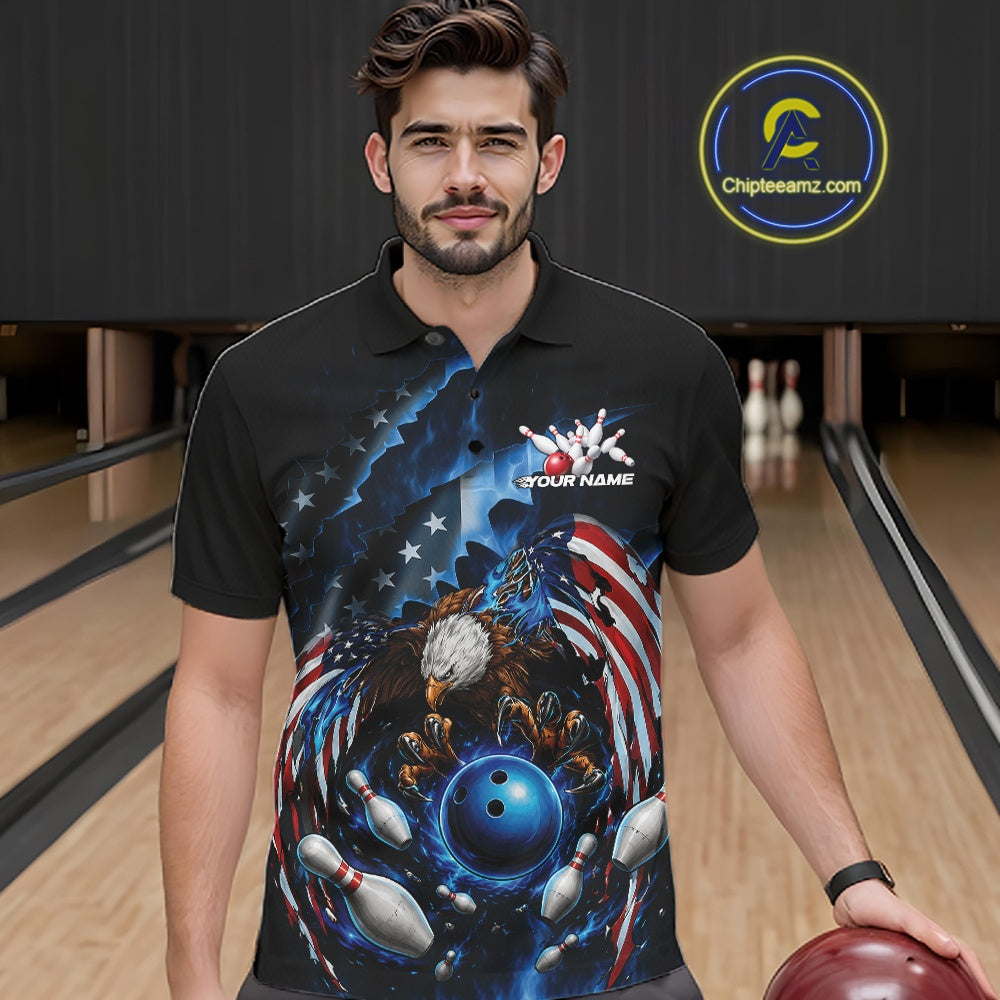 Front view of a male model at a bowling lane wearing a bowling polo shirt with bald eagle, blue bowling ball, flying pins, and American flag artwork.