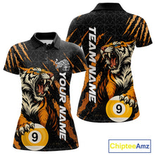 Load image into Gallery viewer, Front and back women’s polo shirt mockup with roaring tiger artwork emerging through orange claw marks while gripping billiard balls.
